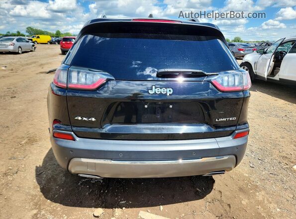 1C4PJMDX4KD304082 2019 JEEP CHEROKEE Black Widok z tyłu