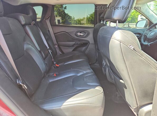1C4PJMLB7MD210397 2021 JEEP CHEROKEE Maroon Vista interior trasera