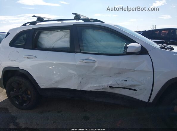 1C4PJMLN7KD292249 2019 JEEP CHEROKEE White Vista interior trasera