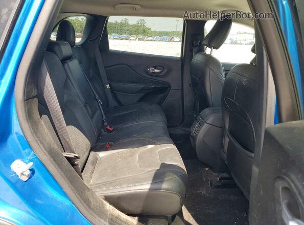 1C4PJMMB8PD115611 2023 JEEP CHEROKEE Blue Rear interior view