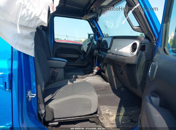 1C4PJXDG4SW561961 2025 JEEP WRANGLER Blue Widok wnętrza z przodu