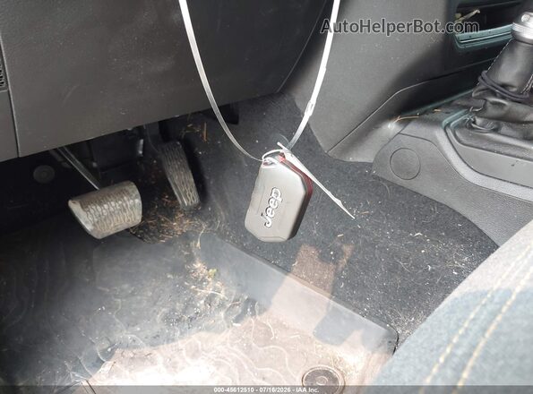 1C4PJXDG5SW659106 2025 JEEP WRANGLER Gray Vista del salpicadero