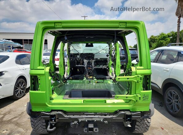 1C4PJXDN7TW208310 2026 JEEP WRANGLER Green Vista trasera