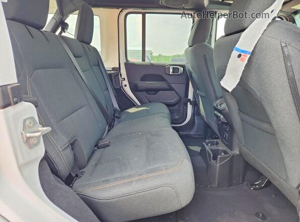 1C4PJXEG6TW254288 2026 JEEP WRANGLER White Widok wnętrza z tyłu