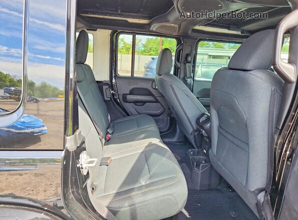 1C4PJXEG9SW612546 2025 JEEP WRANGLER Black Rear interior view