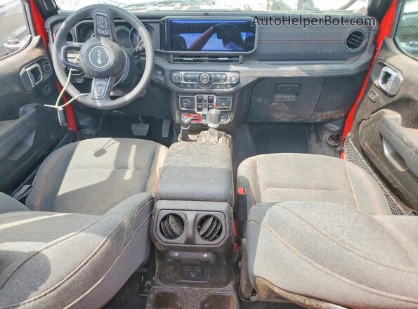 1C4PJXFGXTW256902 2026 JEEP WRANGLER Red Widok deski rozdzielczej