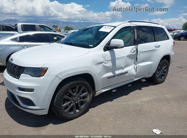 1C4RJECG7JC216342 2018 JEEP GRAND CHEROKEE White Vista tres cuartos delantera izquierda