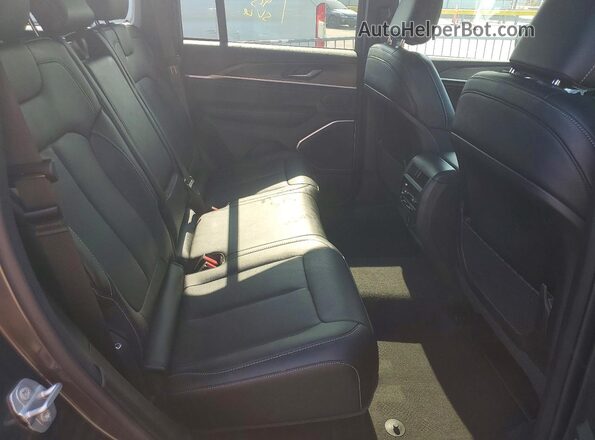 1C4RJHBR8TC260860 2026 JEEP GRAND Gray Vista interior trasera