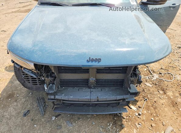 1C4RJHER9T8554895 2026 JEEP GRAND Teal Սալոնի հետևի տեսք