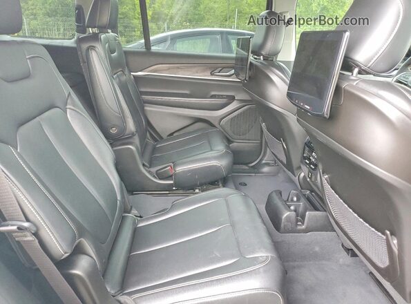 1C4RJJBG6P8714487 2023 JEEP GRAND White Rear interior view