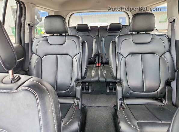 1C4RJKBG0P8719352 2023 JEEP GRAND Maroon Rear seats view