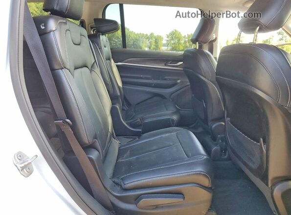 1C4RJKBG0P8754084 2023 JEEP GRAND White Rear interior view
