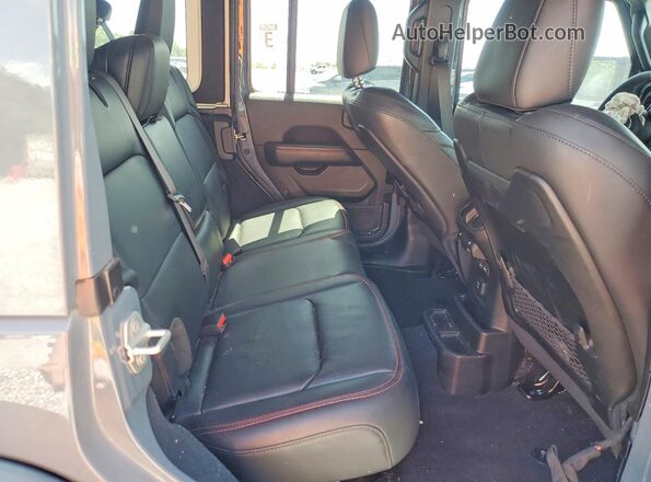 1C4RJXFG2RW165401 2024 JEEP WRANGLER Синий Вид задней части салона