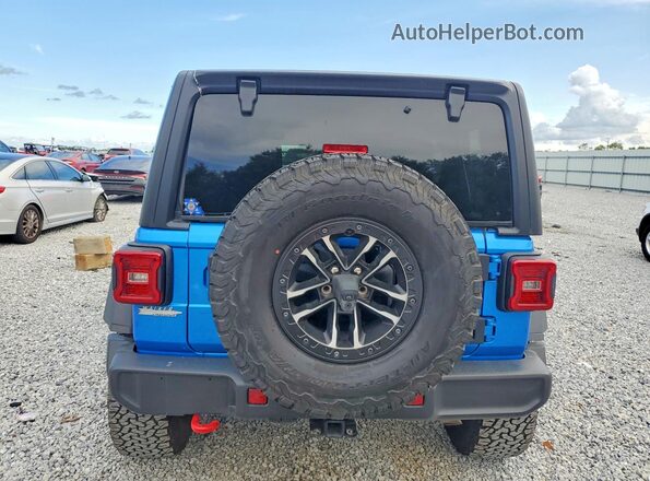 1C4RJXFG5RW150892 2024 JEEP WRANGLER Blue Widok z tyłu