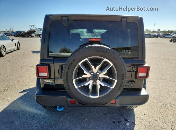 1C4RJXN64RW133641 2024 JEEP WRANGLER Black Widok z tyłu