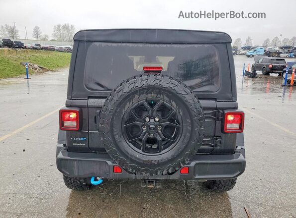 1C4RJXN69RW202033 2024 JEEP WRANGLER Black Вид ззаду
