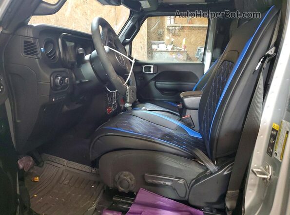 1C4RJXR68RW242470 2024 JEEP WRANGLER Silver Вид салону спереду