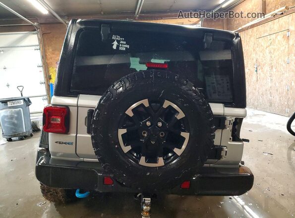 1C4RJXR68RW242470 2024 JEEP WRANGLER Silver Вид ззаду