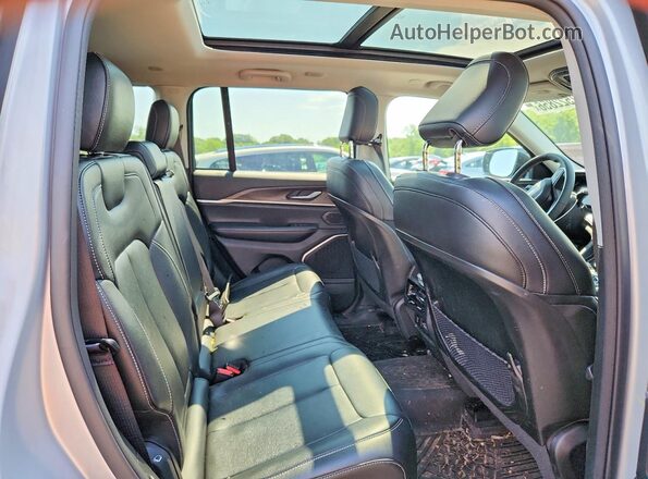 1C4RJYB69PC670837 2023 JEEP GRAND Silver Rear seats view