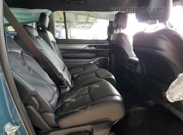 1C4SJSBP1TS163017 2026 JEEP GRAND Blue Вид задньої частини салону