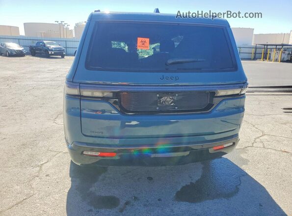 1C4SJVBP8TS173142 2026 JEEP GRAND Blue Вид ззаду