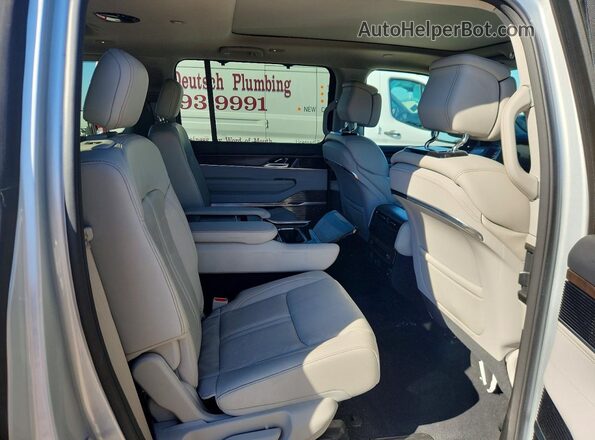 1C4SJVEJ5PS521315 2023 JEEP GRAND Silver Vista interior trasera