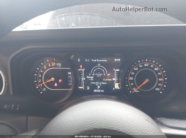 1C6PJTAGXSL536973 2025 JEEP GLADIATOR Gray Vista de los asientos traseros