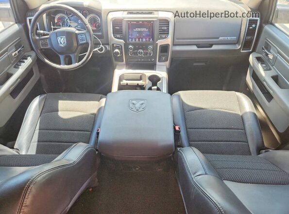 1C6RR6LT2KS604864 2019 RAM 1500 Бордовый Вид панели приборов