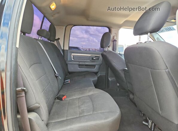 1C6RR6LT7KS665286 2019 RAM 1500 Black Vista de los asientos traseros