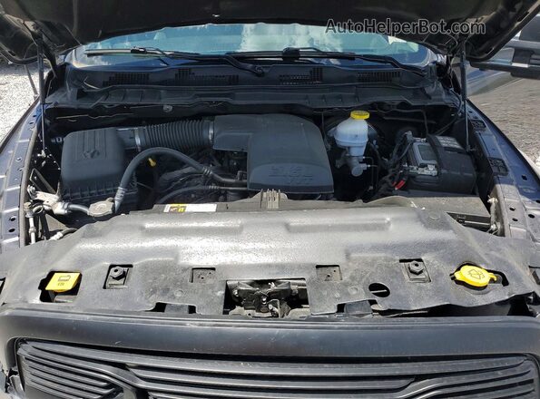 1C6RR7KG0PS555228 2023 RAM 1500 Серый Вид задней части салона