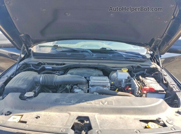 1C6SRFBT8KN736237 2019 RAM 1500 Черный Вид задней части салона