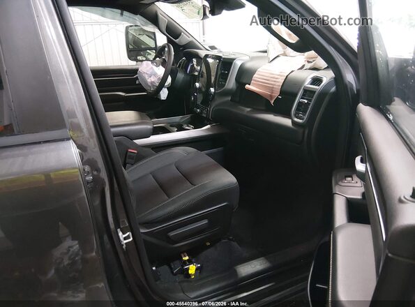 1C6SRFFPXSN689869 2025 RAM 1500 Серый Вид салона спереди