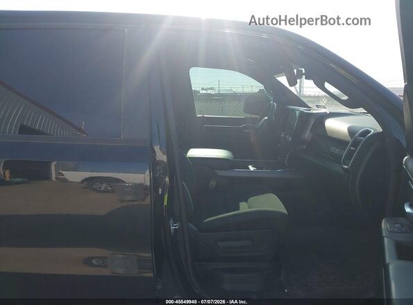 1C6SRFFT5PN613738 2023 RAM 1500 Black Front interior view