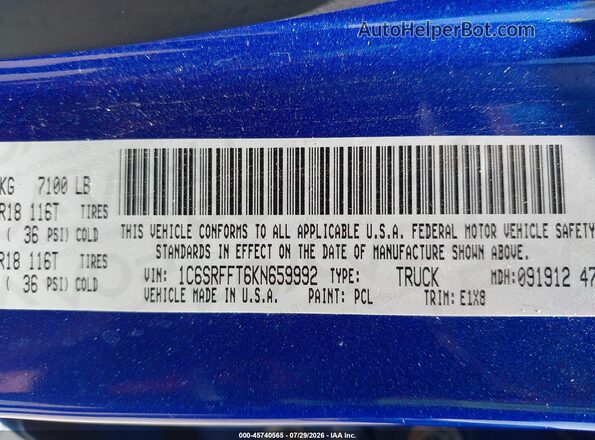 1C6SRFFT6KN659992 2019 RAM 1500 Blue Vista del compartimento del motor
