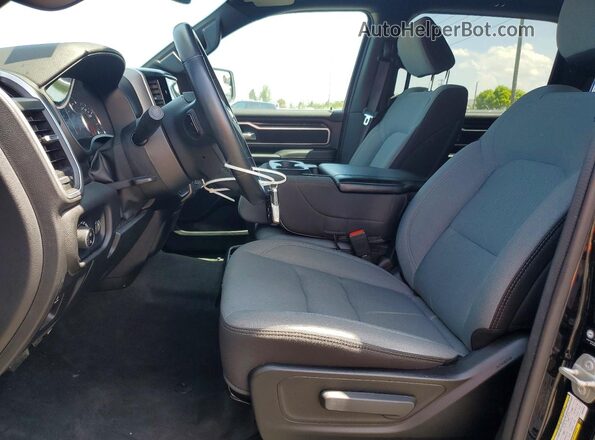 1C6SRFFT8PN687879 2023 RAM 1500 Черный Вид салона спереди
