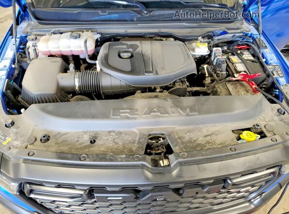 1C6SRFGP4SN653738 2025 RAM 1500 Blue Rear interior view