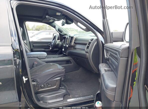 1C6SRFHT0PN678168 2023 RAM 1500 Black Front interior view