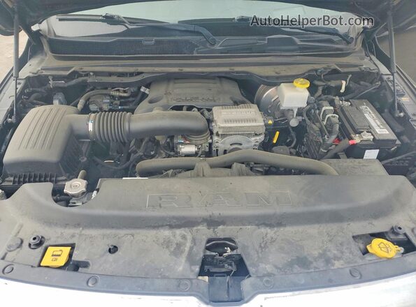 1C6SRFHT3PN542696 2023 RAM 1500 Черный Вид задней части салона