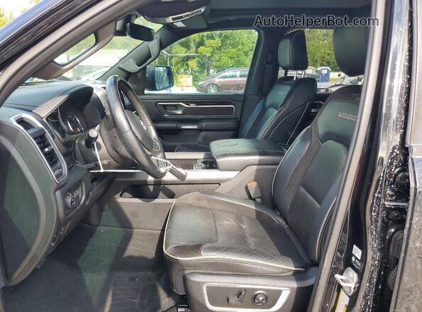 1C6SRFJT2MN581558 2021 RAM 1500 Черный Вид салона спереди