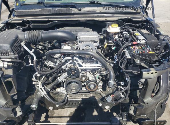 1C6SRFJT2TN282585 2026 RAM 1500 Черный Вид задней части салона