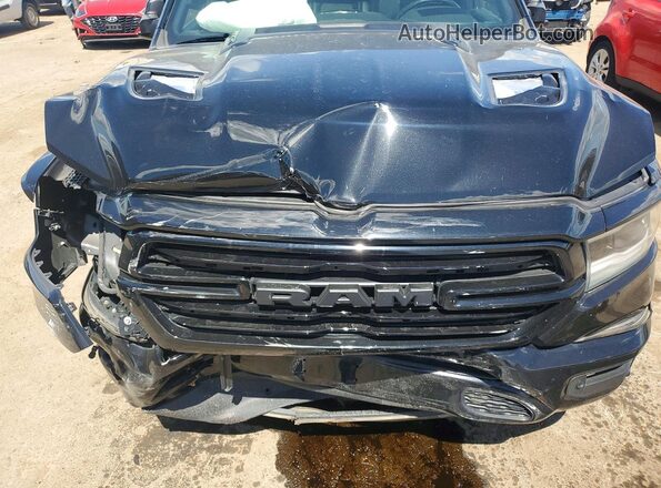 1C6SRFJT3KN708671 2019 RAM 1500 Черный Вид задней части салона