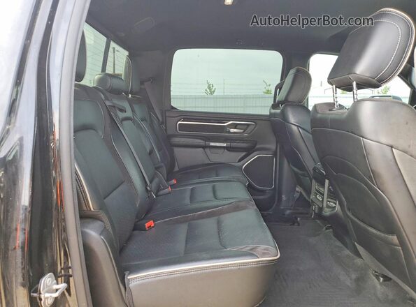 1C6SRFJT3LN328327 2020 RAM 1500 Black Rear seats view
