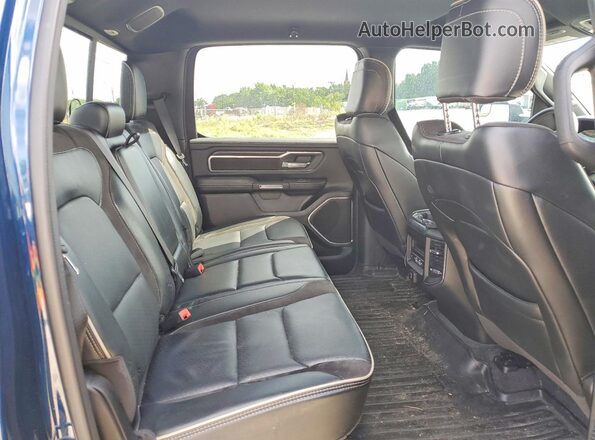 1C6SRFJT6RN159378 2024 RAM 1500 Blue Vista de los asientos traseros