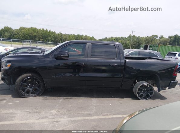 1C6SRFJTXRN150859 2024 RAM 1500 Черный Вид задней части салона