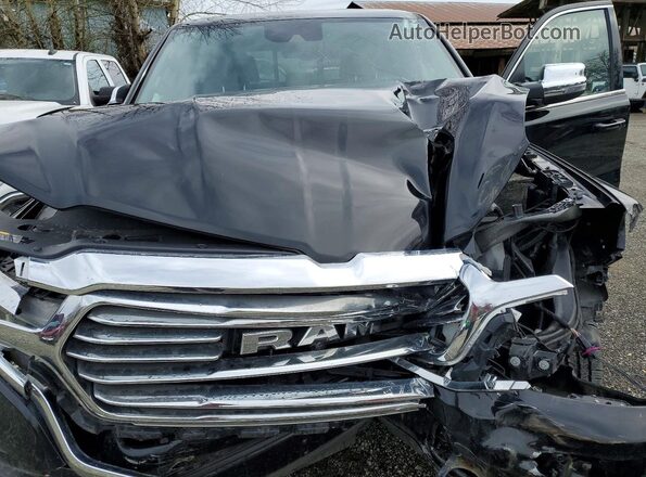 1C6SRFKT4PN699534 2023 RAM 1500 Черный Вид задней части салона