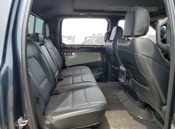 1C6SRFLP0SN766866 2025 RAM 1500 Gray Vista de los asientos traseros