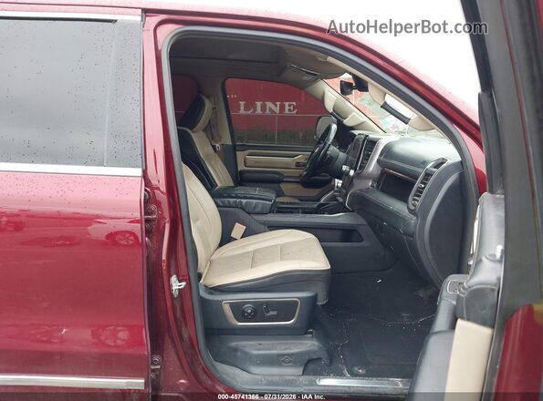 1C6SRFPTXKN672095 2019 RAM 1500 Maroon Front interior view