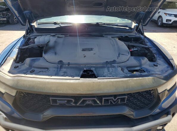 1C6SRFU9XRN201387 2024 RAM 1500 Синий Вид задней части салона