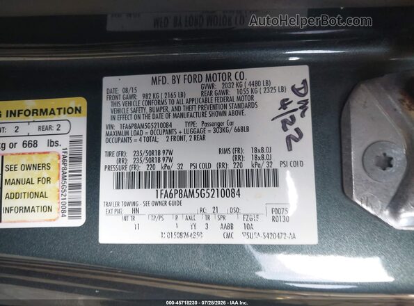 1FA6P8AM5G5210084 2016 FORD MUSTANG Green Vista del compartimento del motor