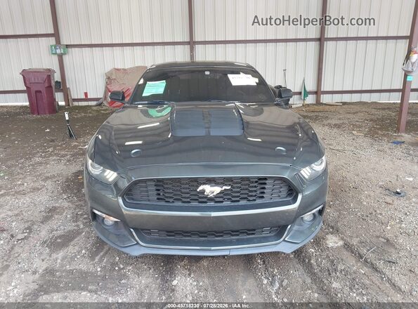 1FA6P8AM5G5210084 2016 FORD MUSTANG Green Vista interior trasera